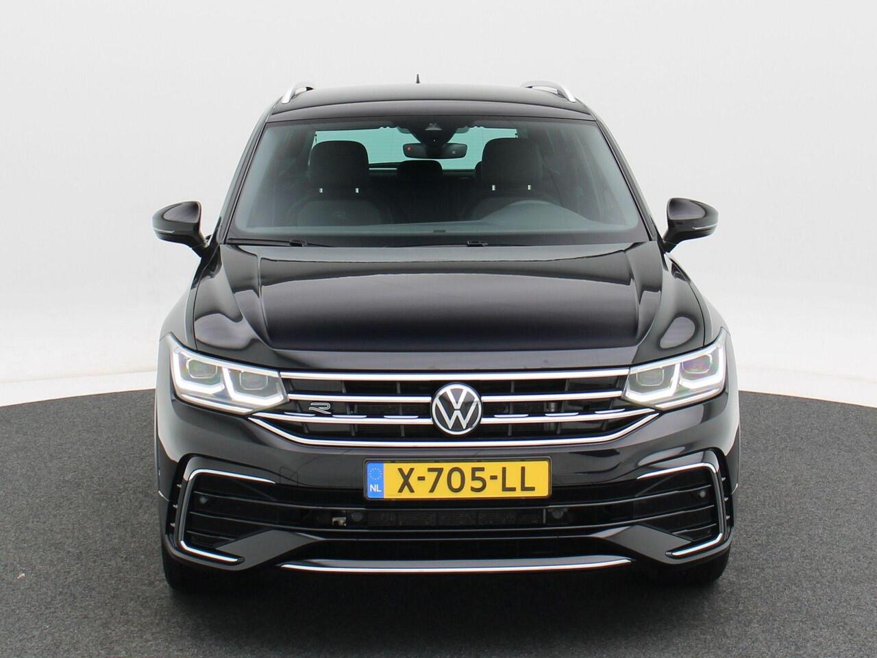 Volkswagen TIGUAN 1.4 TSi 245 Pk eHybrid R-Line Business Automaat | Trekhaak | LED | Stoel en Stuur Verwarming | Adaptive Cruise | Carplay | Navigatiesysteem | Parkeersensoren | Camera | Elektrische Achterklep | 20 Inch | 30.380 Km!!
