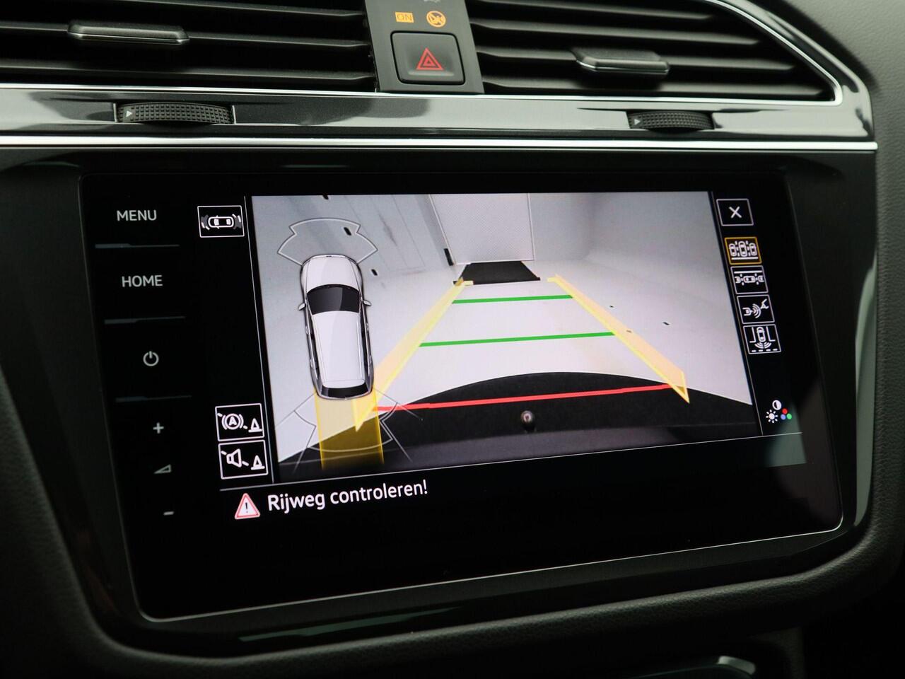 Volkswagen TIGUAN 1.4 TSi 245 Pk eHybrid R-Line Business Automaat | Trekhaak | LED | Stoel en Stuur Verwarming | Adaptive Cruise | Carplay | Navigatiesysteem | Parkeersensoren | Camera | Elektrische Achterklep | 20 Inch | 30.380 Km!!