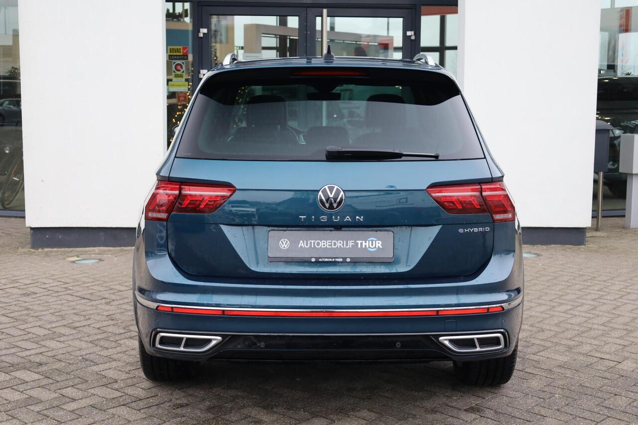 Volkswagen TIGUAN 1.4 TSI eHybrid R-Line Business+ PL ¤720 p/m* 150PK / 110kW panoramadak Lederenbekleding + elektrische stoelverstelling met geheugen stoelverwarming area view rondom zicht camera stuurwiel verwarming IQ matrix easy open & close park assist acc side assist