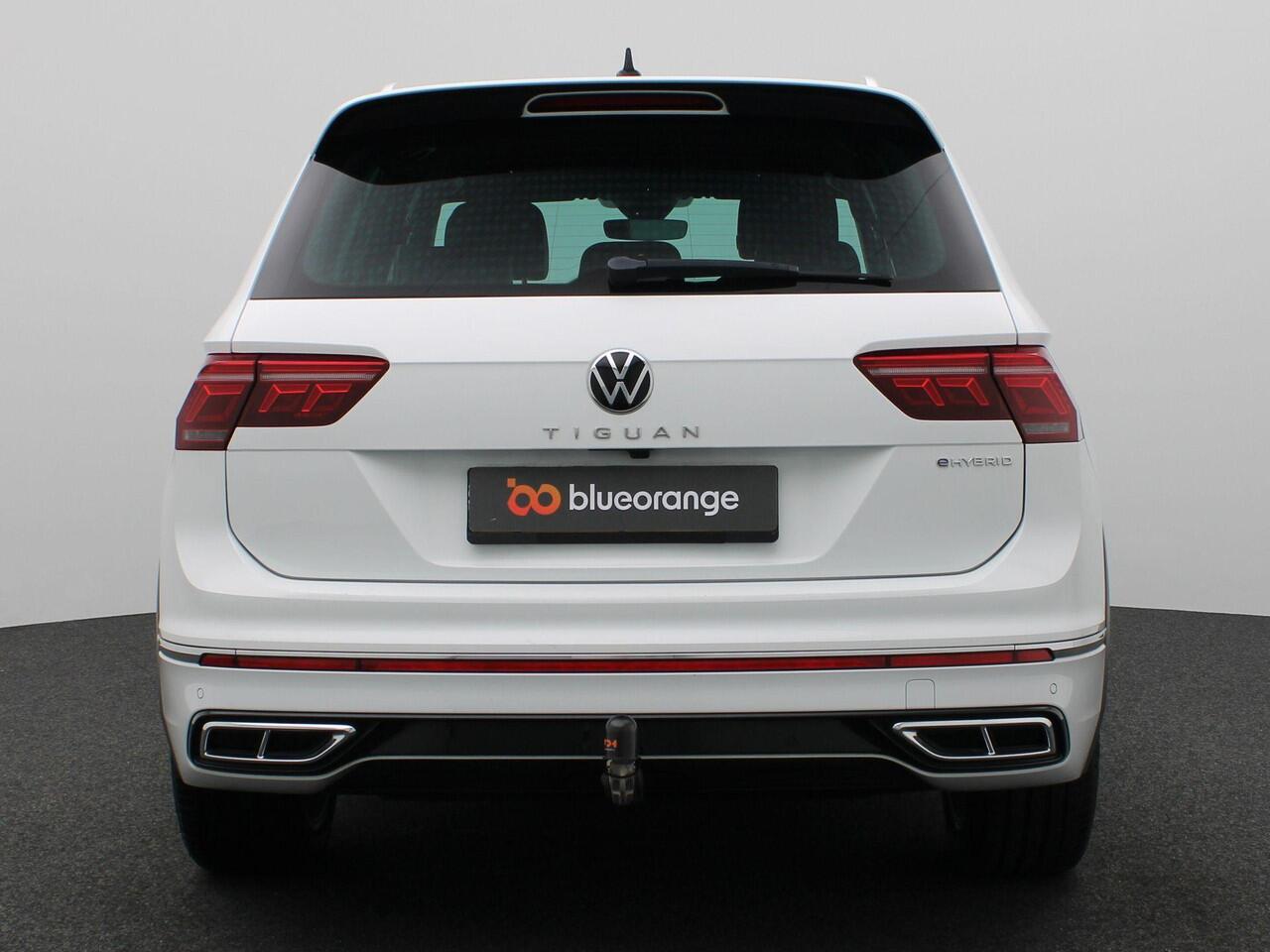 Volkswagen TIGUAN 1.4 TSI eHybrid R-Line Business+ 245PK DSG Trekhaak, Achteruitrijcamera, Keyless, Stoelverwarming, Navi, Clima, Elektr. Achterklep, 19" LM Velgen, Adaptieve Cruise Control