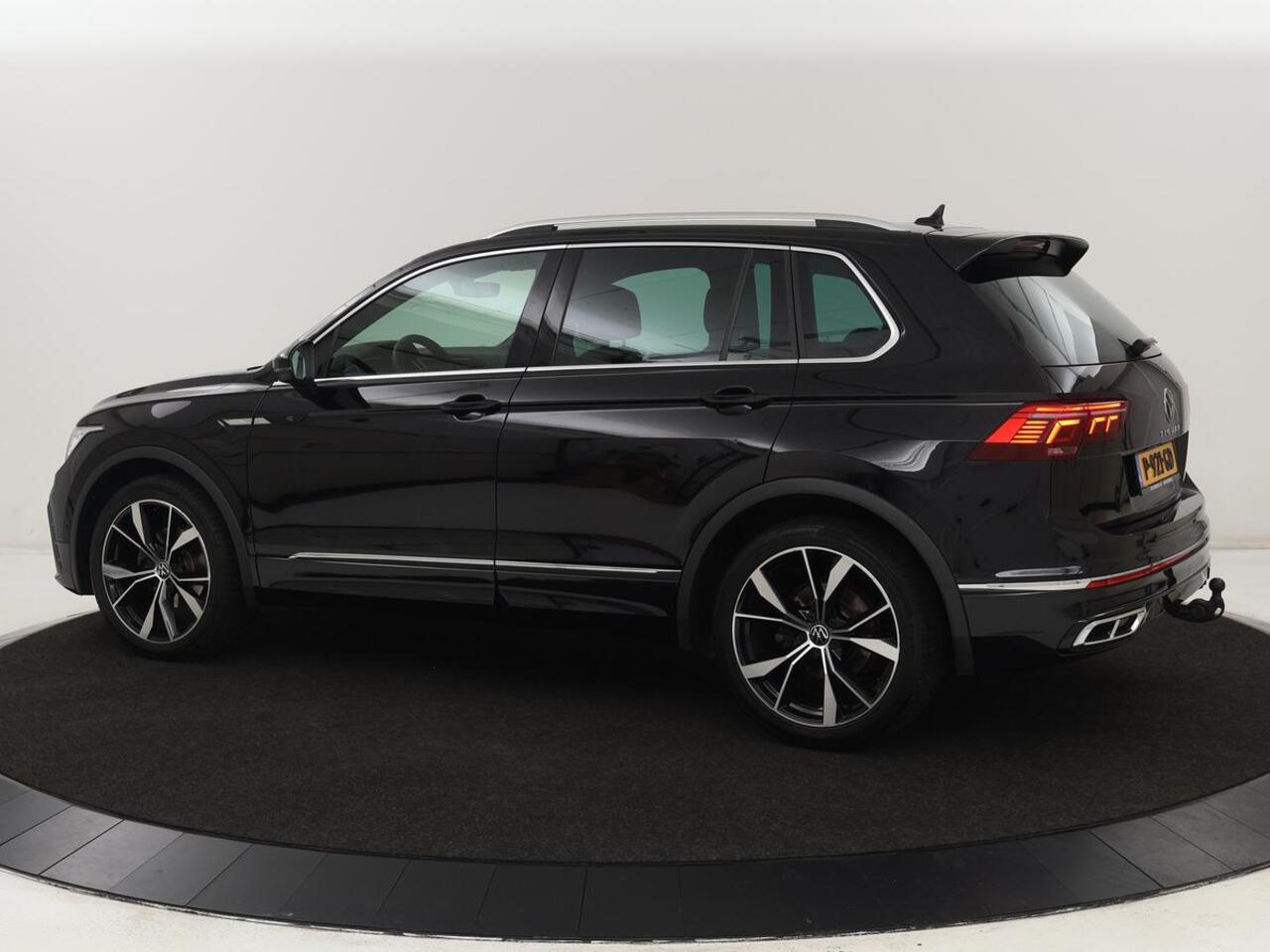 Volkswagen TIGUAN 1.5 TSI R-Line Business+ | Automaat | Trekhaak | Carplay | Stoelverwarming | Stuurverwarming | Adaptive Cruise | LED | Sfeerverlichting | Climate controle | LMV 20 inch