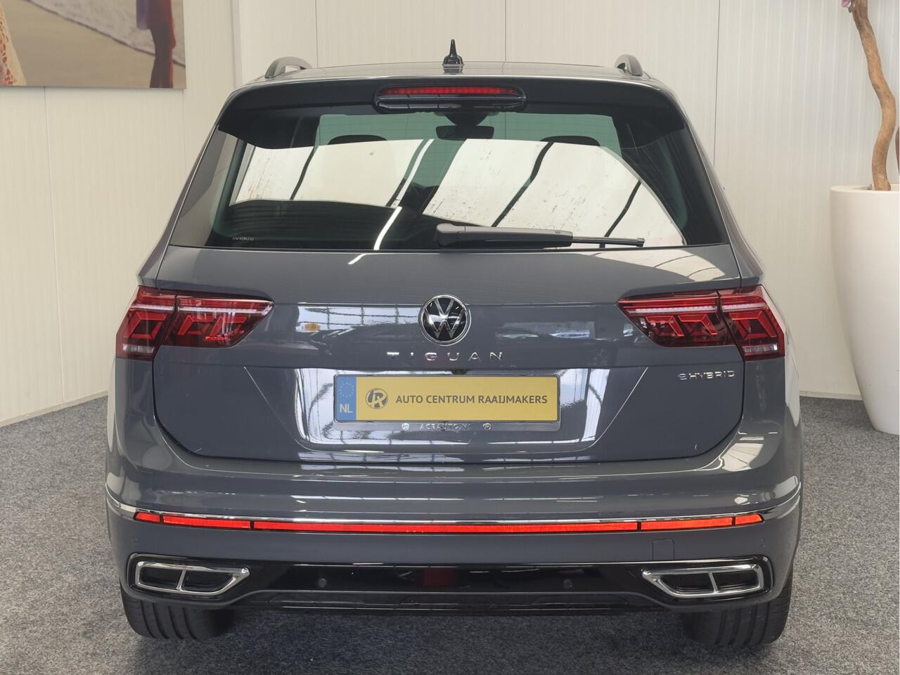 Volkswagen TIGUAN 1.5 E HYBRID R-LINE VOL OPTIES !! NIEUWSTAAT !!! PANORAMADAK 360 CAMERA NAVIGATIE ADAPTIVE CRUISE CONTROL CLIMATE CONTROL APPLE CARPLAY/ANDROID RIJSTROOKSENSOREN DODEHOEKSENSOREN PDC ZEER MOOI !! 3010