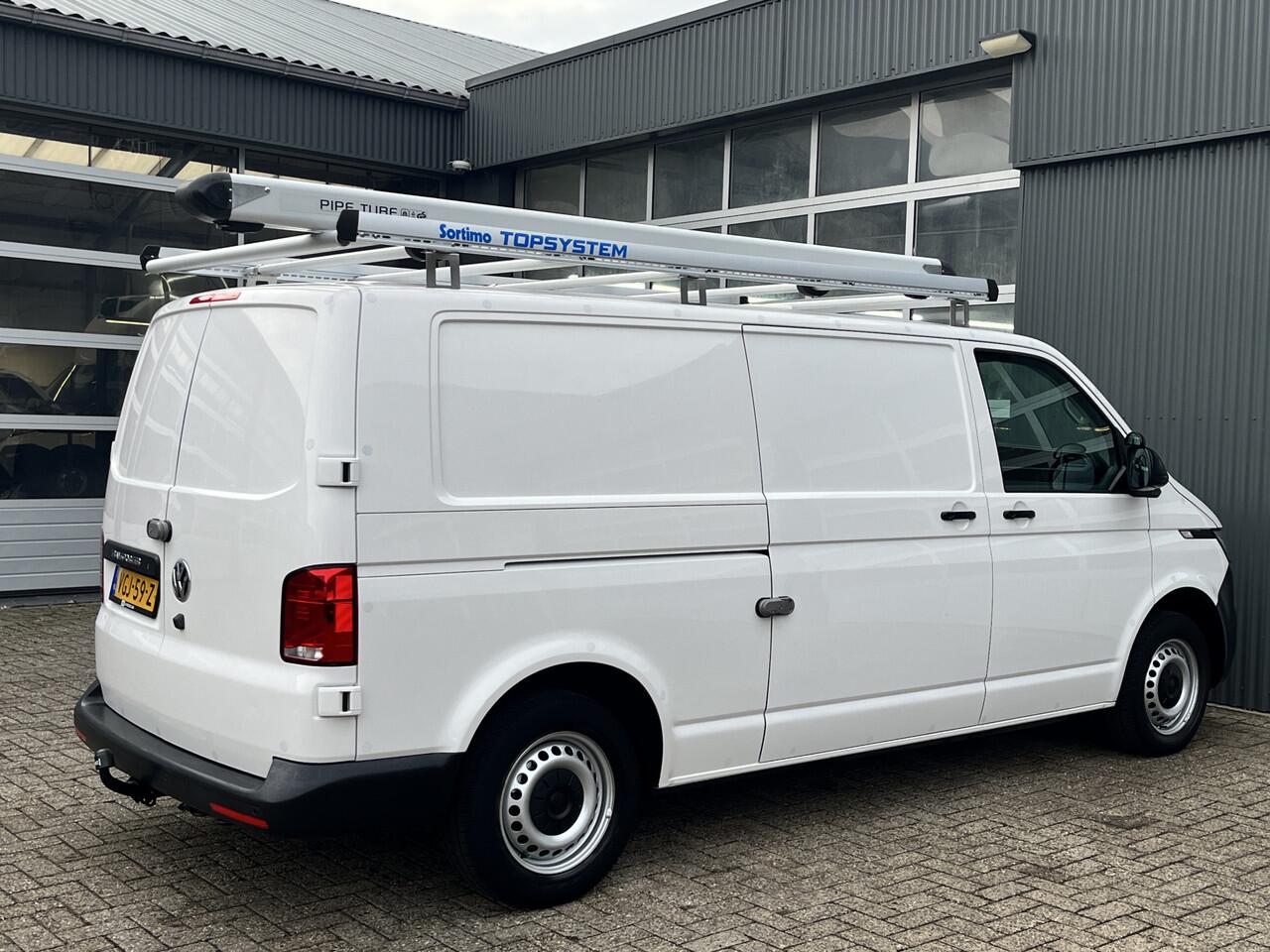 Volkswagen TRANSPORTER 2.0 TDI L2H1 Sortimo Kastinrichting Airco Cruise controle Trekhaak 2200kg trekgewicht Imperiaal Schuifdeur Parkeerhulp achter Telefoonverbinding Euro 6 1e eigenaar Sortimo
