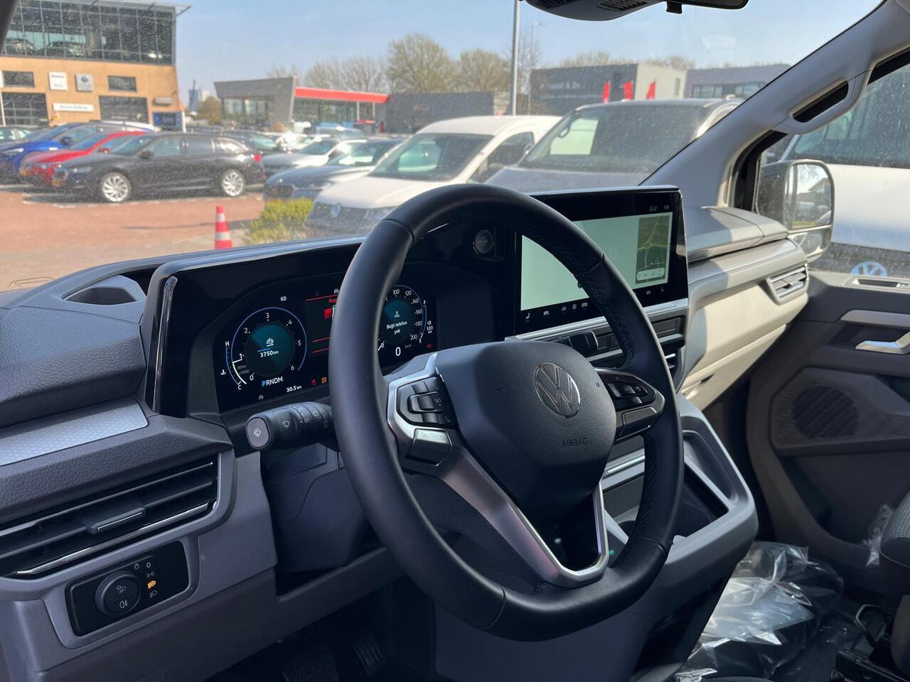 Volkswagen TRANSPORTER Bedrijfswagens Bulli L1 2.0 TDI 110 kW 150 pk 8 versn. Auto | BPM vrij | Exterieurpakket met bumpers, grille, spiegels en handgrepen in carrosseriekleur | Achterdeuren zonder ruit | Diefstalalarmsysteem met interieurbeveiliging, noodsirene en wegsleepbeve