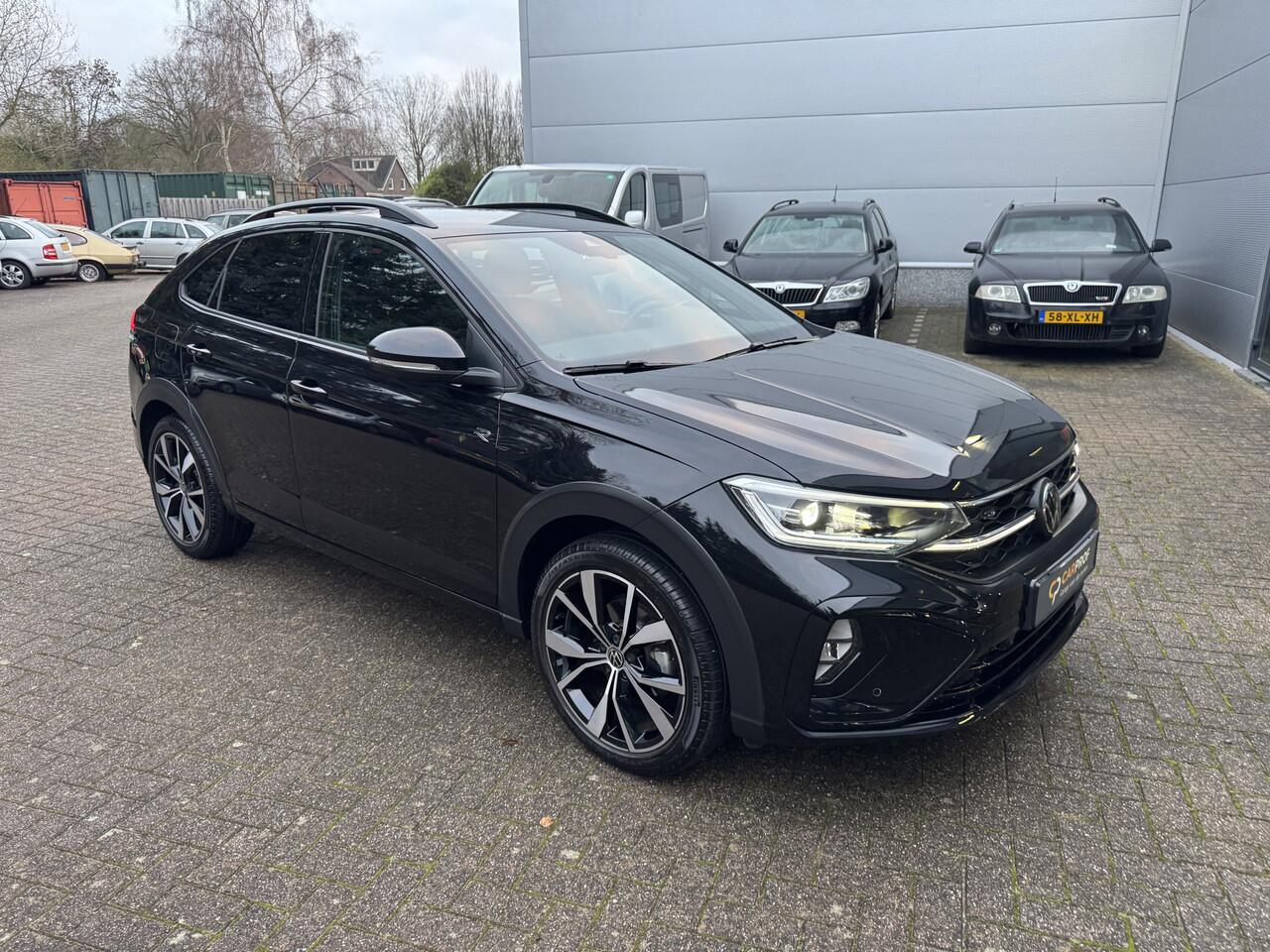 Volkswagen Taigo 1.0 TSI R-Line Edition Incl. afleveringsbeurt en 12 maanden BOVAG-garantie | 18 inch LMV | Stoelverwarming | Adaptive | Apple Carplay |