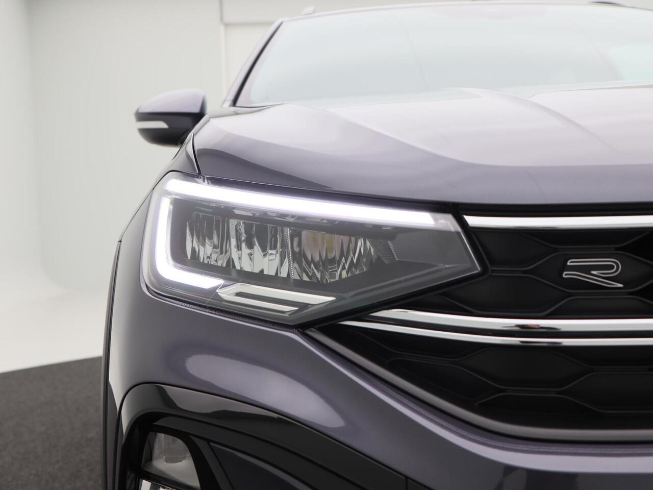 Volkswagen Taigo 1.0 TSi 110 Pk Automaat R-Line | Adaptive Cruise | Trekhaak | Stoelverwarming | Camera | LED | Digitale Cockpit | Airco | Sensoren | Privacy Glass | 17 Inch | 14.039 Km!!