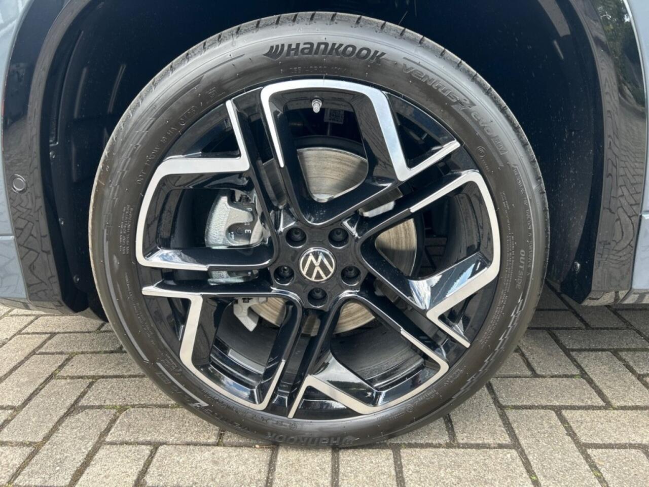 Volkswagen Tayron 1.5 E-HYBRID R-LINE 272PK PANO-DAK/CAMERA/TREKHAAK/MEMORY/LEDER/HenK