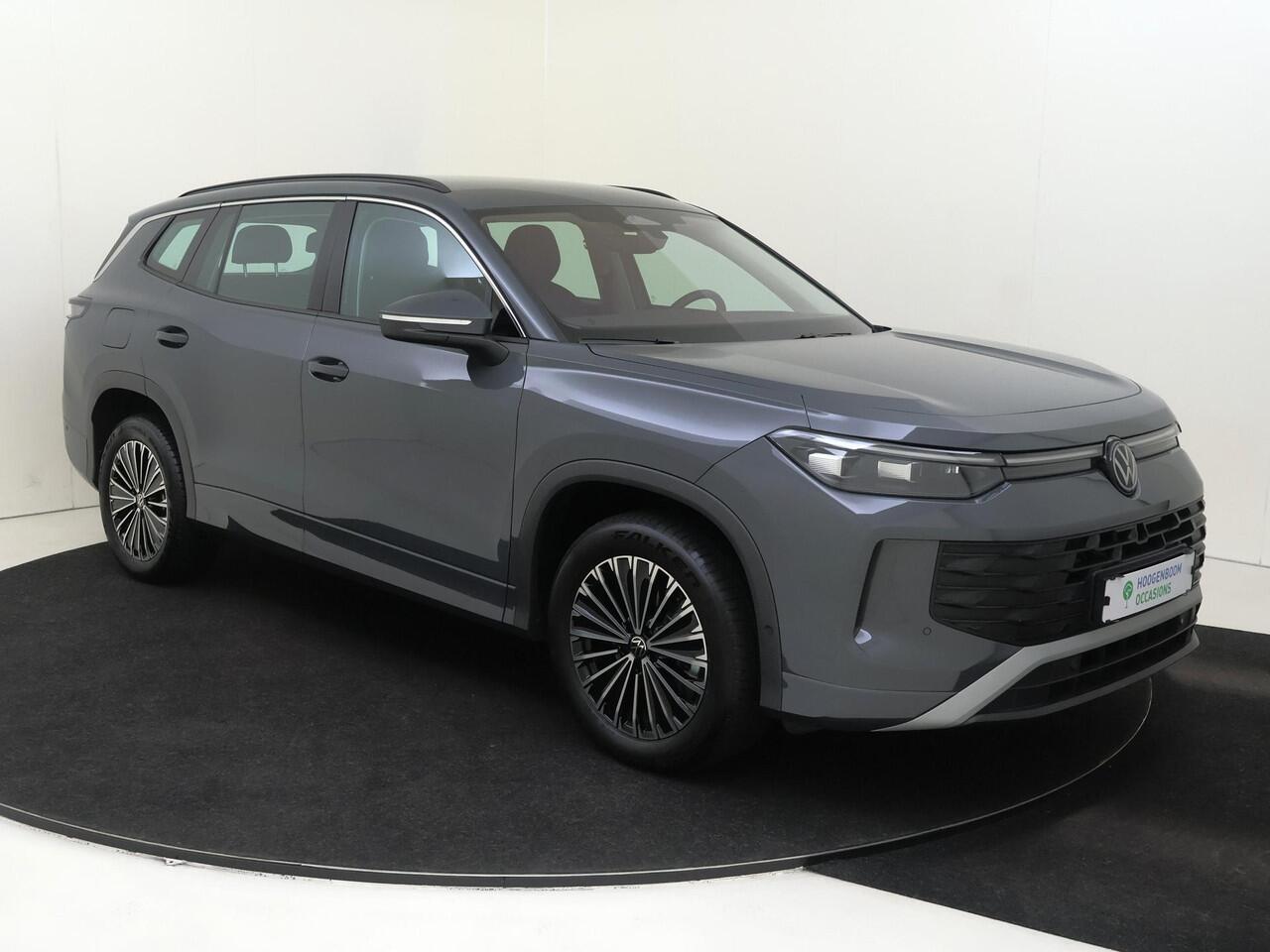 Volkswagen Tayron 1.5 eHybrid Life Edition | SoH 100% | Trekhaak | Adaptieve demping systeem | Achteruitrijcamera | 3-zone airco | Dodehoek detectie | Adaptieve cruise control | Stoel- en stuurwielverwarming | CarPlay |