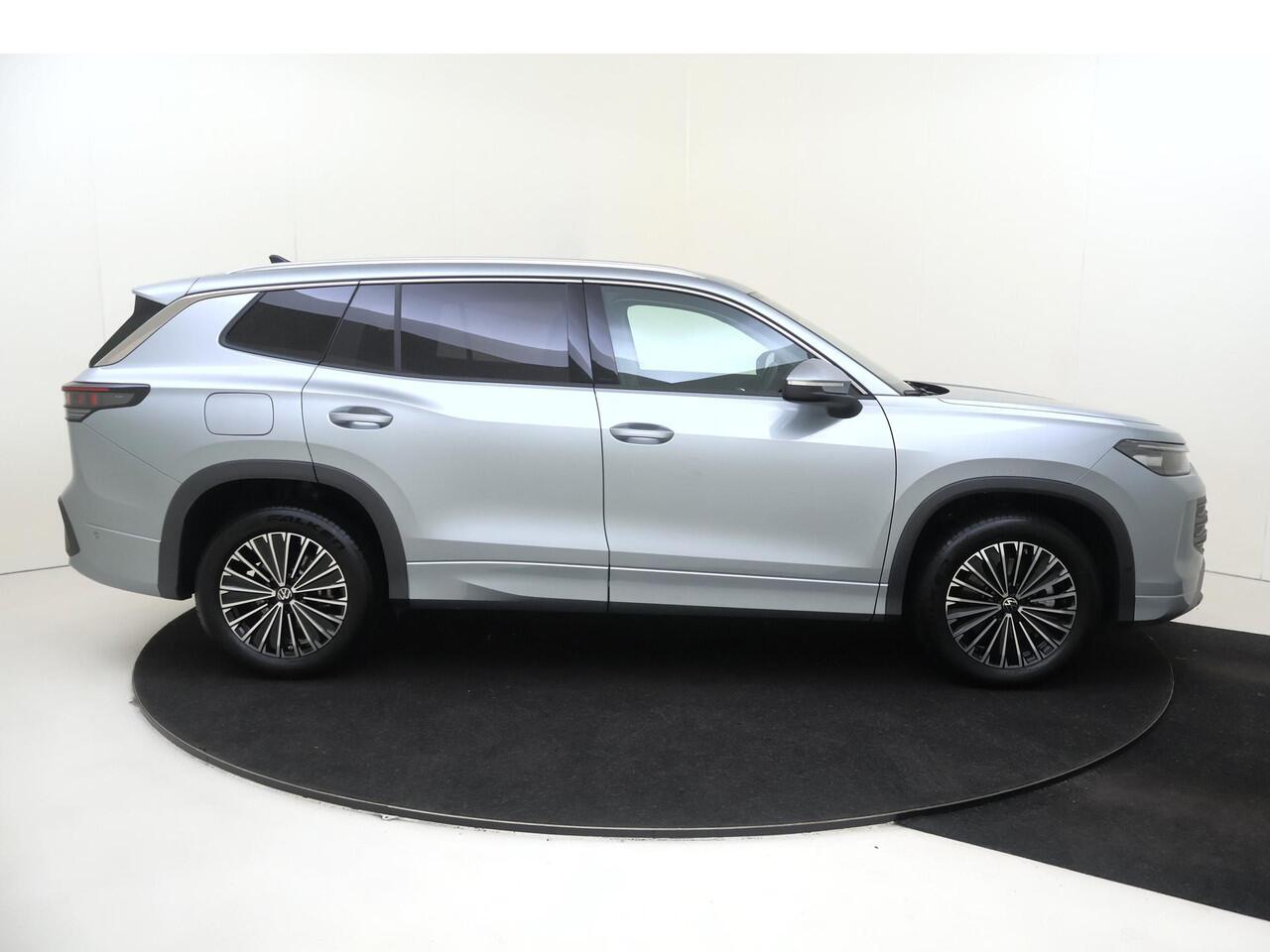 Volkswagen Tayron 1.5 eHybrid Life Edition | SoH 100% | Trekhaak | Achteruitrijcamera | Adaptieve demping systeem | 3-zone airco | Dodehoek detectie | Adaptieve cruise control | CarPlay | Stoel- en stuurwielverwarming |