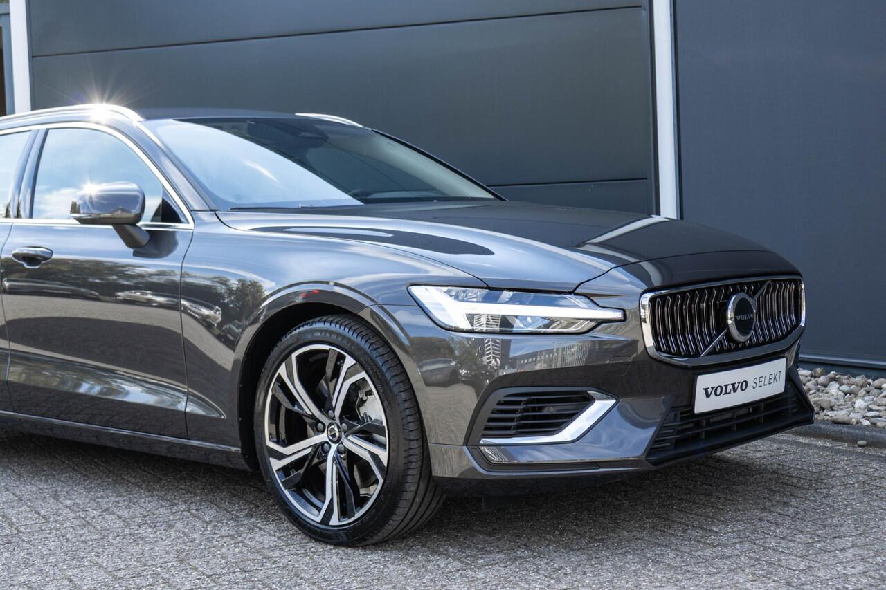 Volvo V60 T6 Plug-in hybrid AWD Plus Bright | Lederen interieur | Semi Elektrische Trekhaak | Keyless | Climate Pack | Elektrisch verstelbare stoelen | Adaptieve Cruise Control | Google Infotainment | 19 inch Lichtmetalen velgen | Parkeercamera en sensoren rondom |
