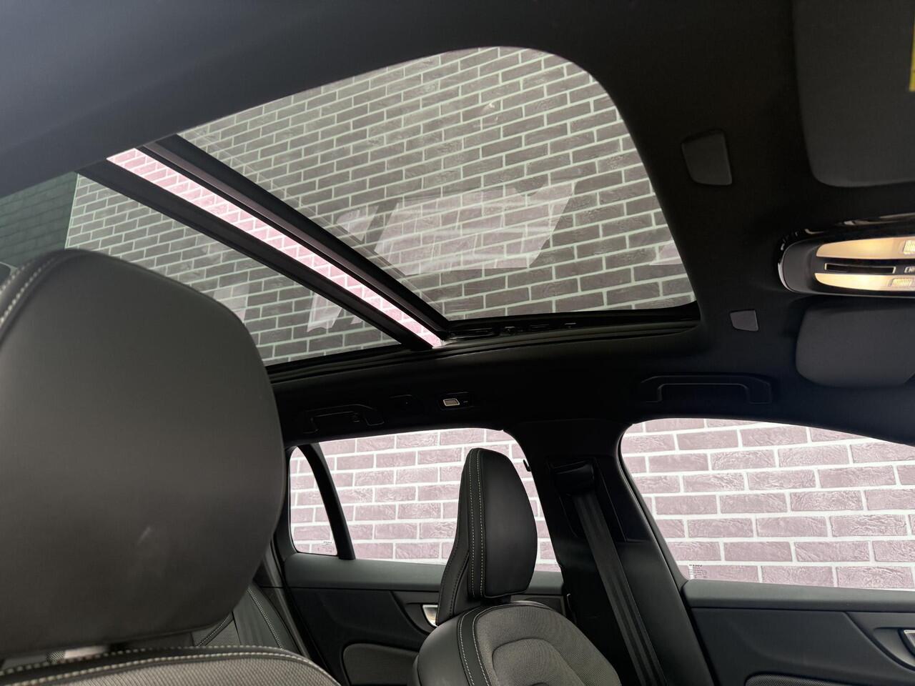 Volvo V60 2.0 T6 Plug-in hybrid AWD Plus Dark | Trekhaak | Adaptive Cruise Control | Panoramadak | 360 Camera | Harman/Kardon | Stuurverwarming | Stoelverwarming voor & achter | Power Seats | Sportstoelen |