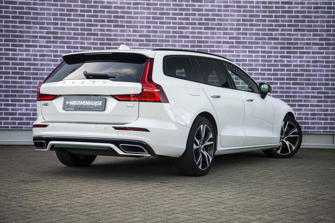 Volvo V60 2.0 T6 Recharge AWD R-Design | Stoel- en stuurwielverwarming | Navigatie | Achteruitrijcamera | Apple Carplay / Android Auto | DAB+ radio | Keyless | LED koplampen | Sportstoelen | Elektrische stoelverstelling |