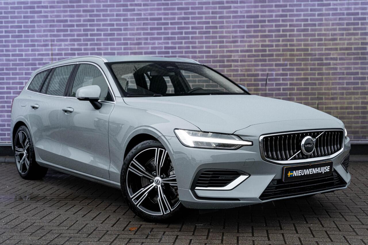 Volvo V60 T6 Plug-in hybrid AWD Essential Bright | Trekhaak | Lederen bekleding | 19" velgen | Google Maps navigatie | Apple Carplay / Android Auto | LED koplampen |
