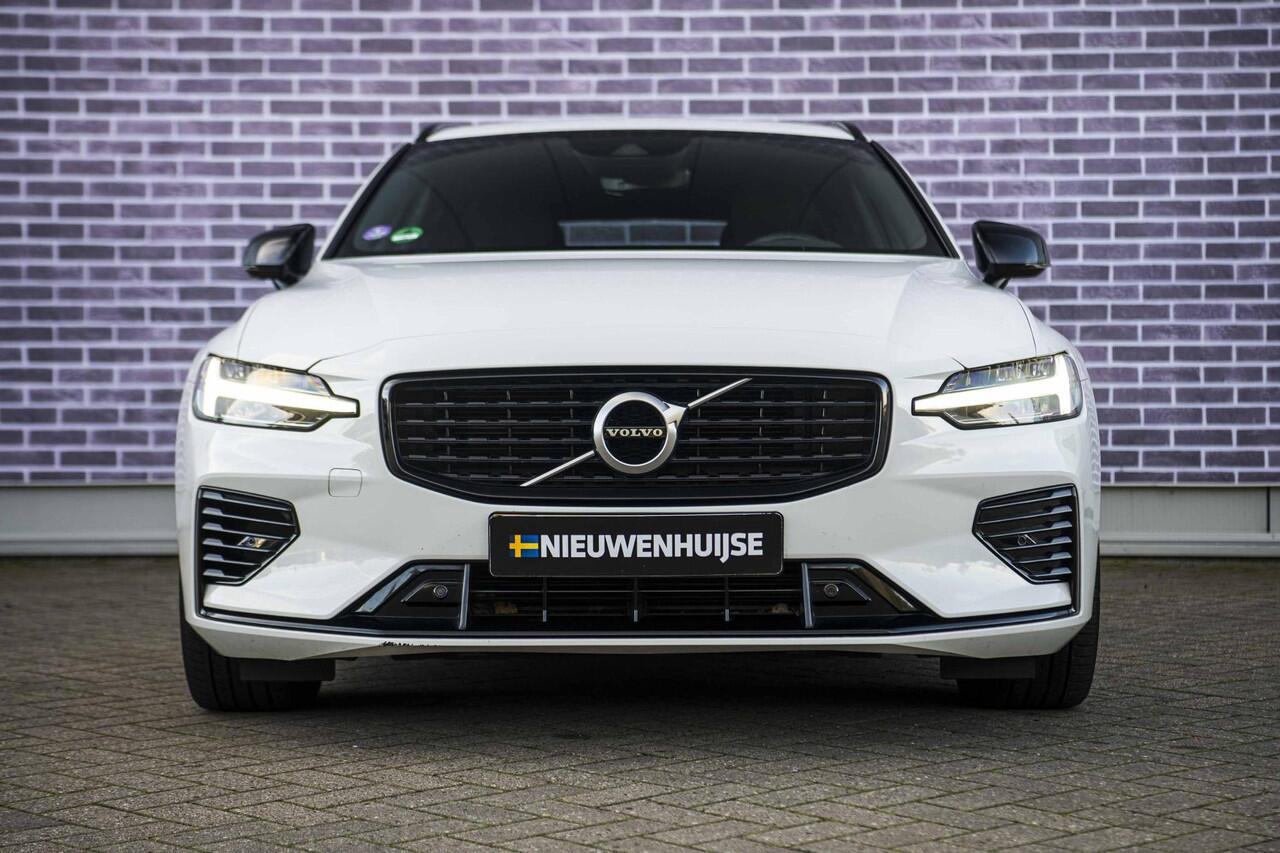Volvo V60 2.0 T6 Recharge AWD R-Design | Stoel- en stuurwielverwarming | Navigatie | Achteruitrijcamera | Apple Carplay / Android Auto | DAB+ radio | Keyless | LED koplampen | Sportstoelen | Elektrische stoelverstelling |