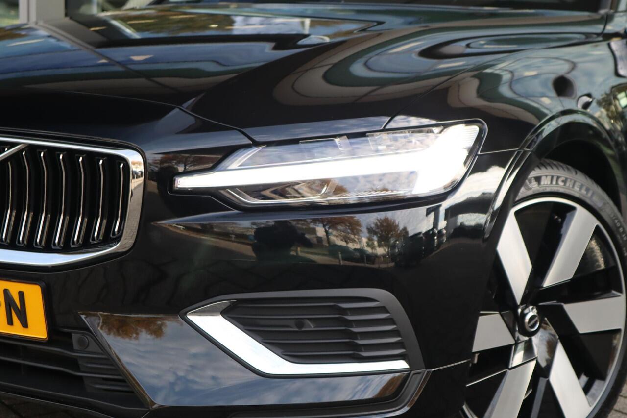 Volvo V60 2.0 T6 Plug-in hybrid AWD Essential Edition | Stoelverwarming voor + achter| Stuurwielverwarming| Side-Skirts| RVS- bumperbescherming achter|