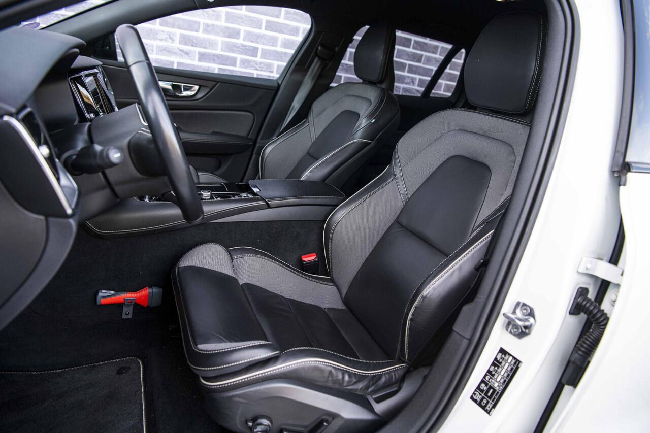 Volvo V60 2.0 T6 Recharge AWD R-Design | Stoel- en stuurwielverwarming | Navigatie | Achteruitrijcamera | Apple Carplay / Android Auto | DAB+ radio | Keyless | LED koplampen | Sportstoelen | Elektrische stoelverstelling |