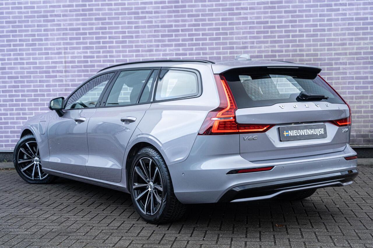 Volvo V60 T6 Plug-in hybrid AWD Plus Dark | Trekhaak | Harman Kardon | 360º Camera | Verwarmbare voorruit | Stoel- / Stuurverwarming Voor + Achter | Adaptive Cruise | BLIS | Verwarmbare voorruit | Power seats
