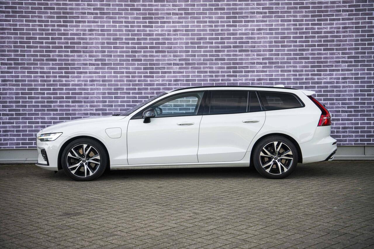 Volvo V60 2.0 T6 Recharge AWD R-Design | Stoel- en stuurwielverwarming | Navigatie | Achteruitrijcamera | Apple Carplay / Android Auto | DAB+ radio | Keyless | LED koplampen | Sportstoelen | Elektrische stoelverstelling |