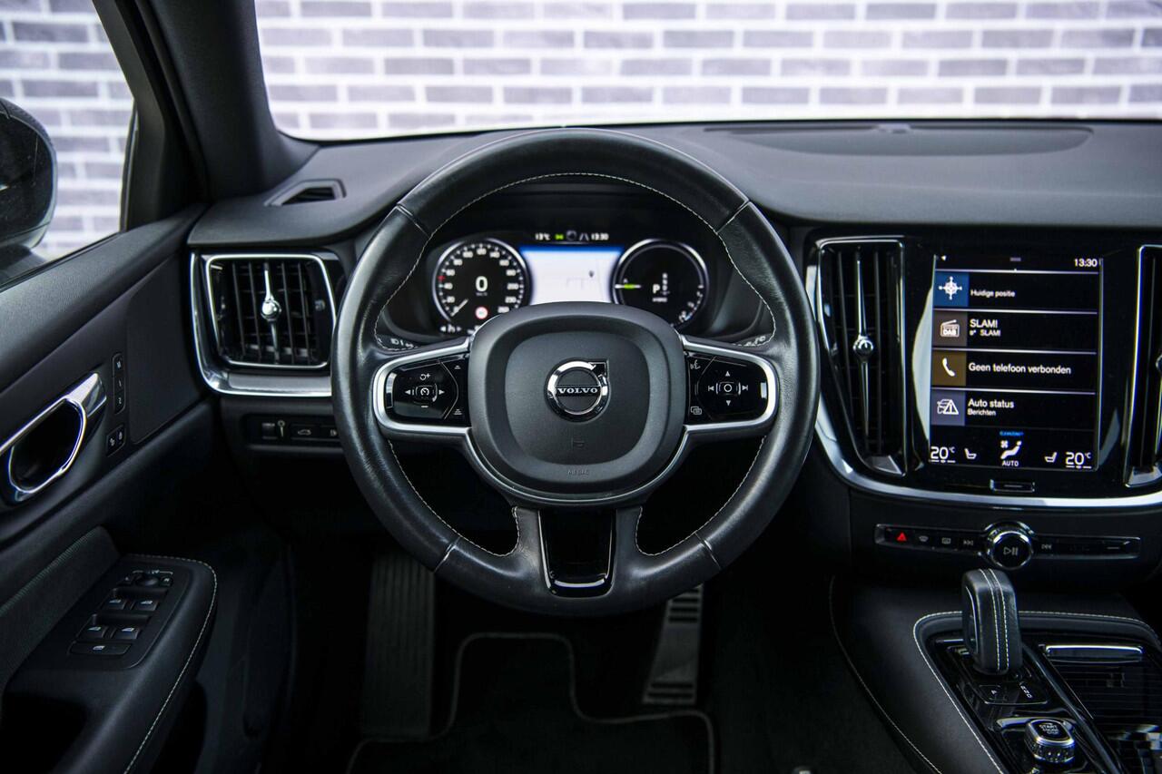 Volvo V60 2.0 T6 Recharge AWD R-Design | Stoel- en stuurwielverwarming | Navigatie | Achteruitrijcamera | Apple Carplay / Android Auto | DAB+ radio | Keyless | LED koplampen | Sportstoelen | Elektrische stoelverstelling |