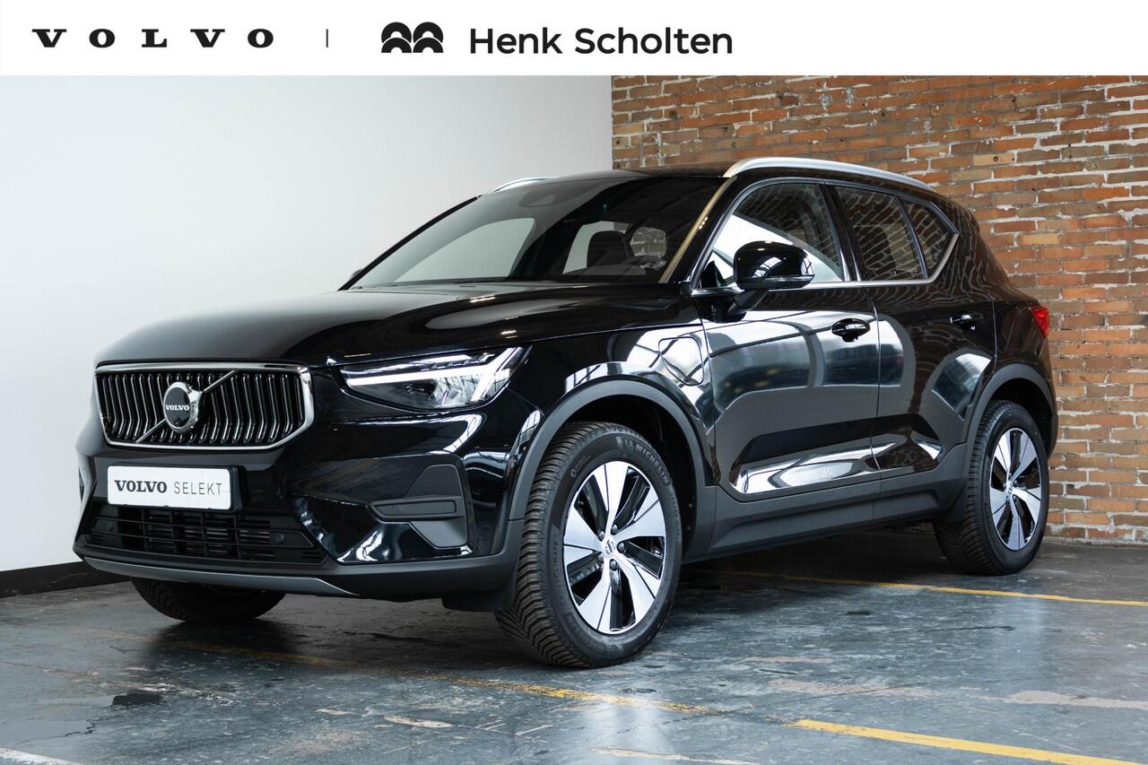 Volvo XC40 T4 Recharge Inscription | 360° Parkeercamera | Semi Electrische Wegklapbare trekhaak | 4-Seizoenenbanden | Draadloze telefoonlader | Panoramadak | Harman Kardon Premium Audio | Stoel en Stuurwielverwarming | Parkeersensoren voor + achter | Parkeerverwarmi