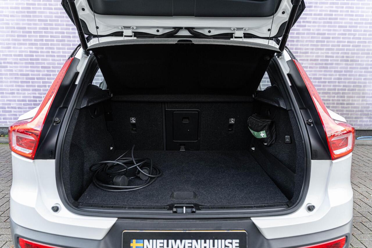Volvo XC40 1.5 T4 Recharge R-Design Expression | Harman Kardon Audio | Stoel - / Stuurverwarming | Adaptive Cruise Control | Parkeerverwarming | Dodehoekdetectie | Parkeer Camera | Parkeer sensoren Voor + Achter | Volvo On Call |