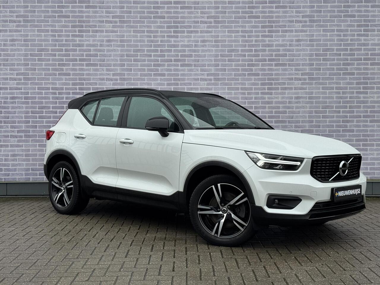 Volvo XC40 Plug-in Hybrid T5 R-Design | Adaptive cruise control | Harman Kardon audio | Stoel- en stuurverwarming | Elektrische stoelverstelling | Achteruitrijcamera | Voorruitverwarming | Parkeersensoren voor + achter | Dode hoek detectie BLIS |