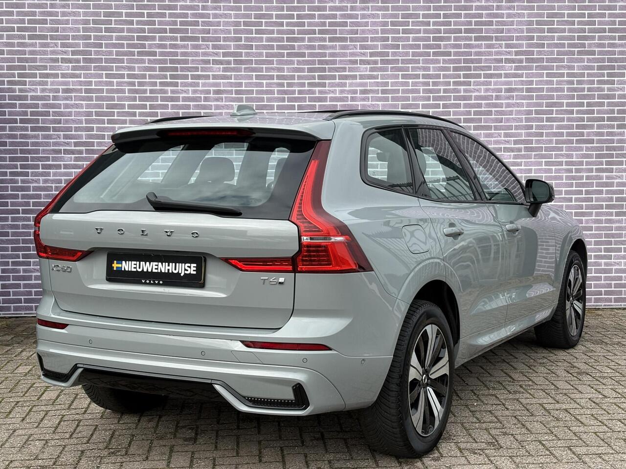 Volvo XC60 2.0 T6 Plug-in hybrid AWD Plus Dark | Adaptieve cruise control | 360° camera | Trekhaak | Stoel- en stuurverwarming | Dode hoek detectie BLIS | Panorama dak | All season banden | Google Auto |